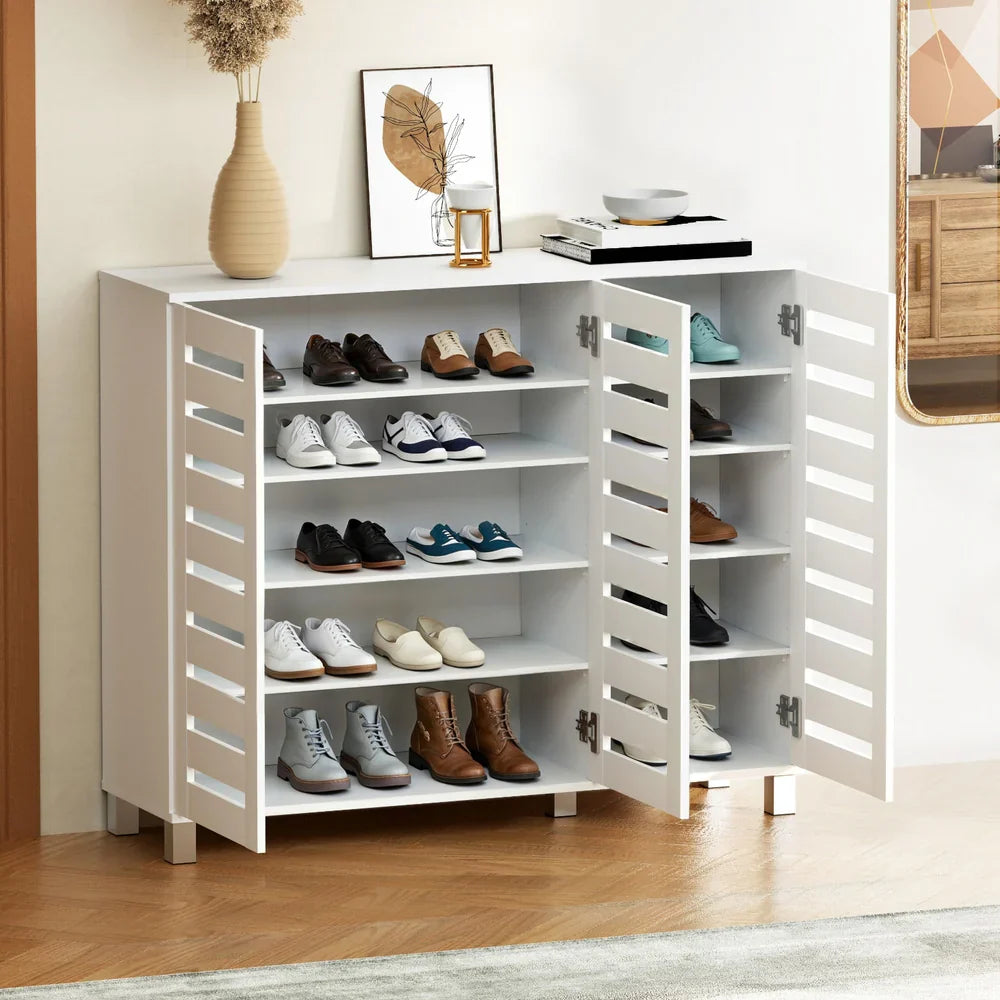 White wooden shoe storage cabinet with multiple shelves and louvre doors, neatly organised with shoes – Bar Stool Centre Australia.