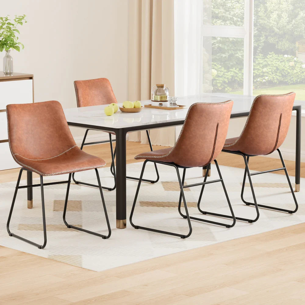 Modern dining set with four brown faux leather chairs and black metal legs around a white rectangular table – Bar Stool Centre.